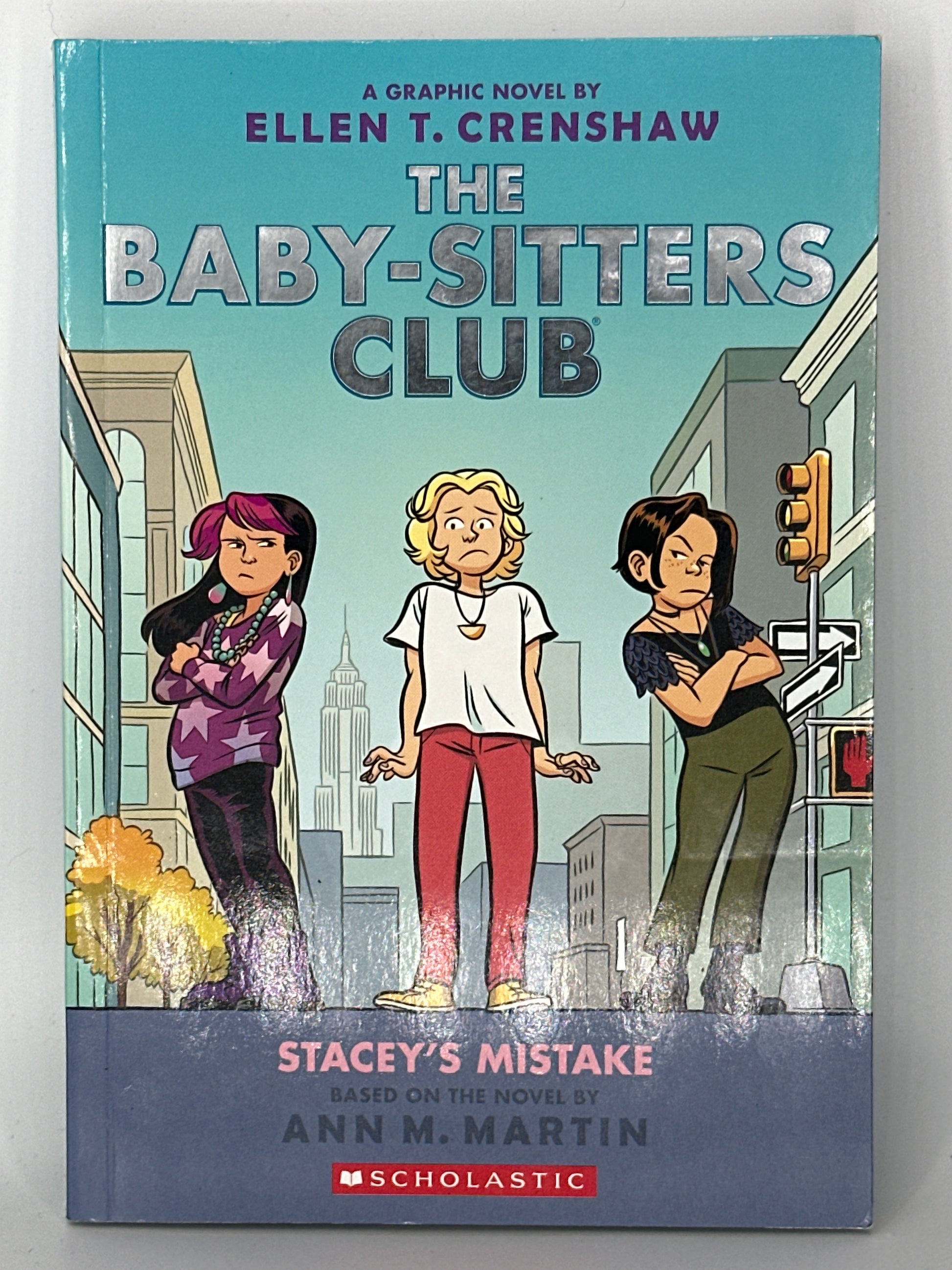 Stacey's Mistake: A Graphic Novel (The Baby-Sitters Club #14) (The Baby-Sitters Club Graphix) front cover used books